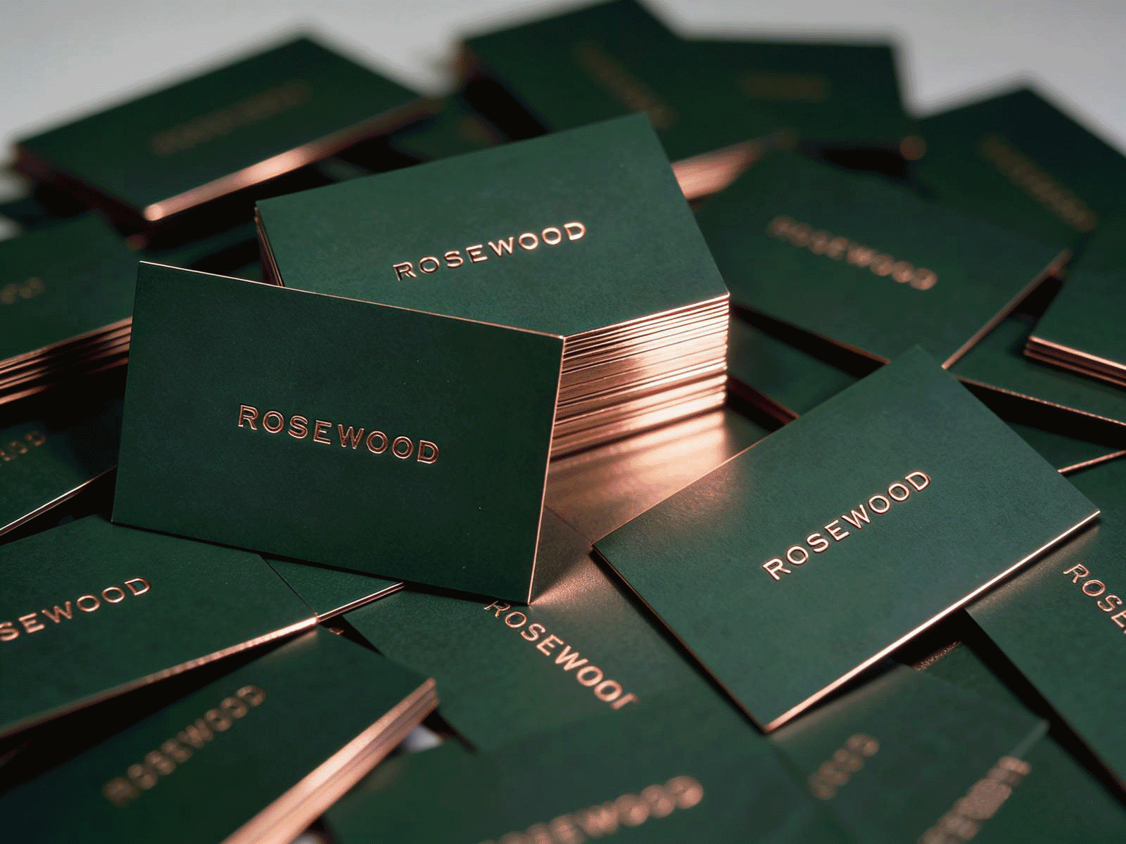 A stack of green and gold cards with the word Rosemead on them.

Description generated by AI